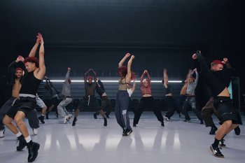 Movie still from “Dua Lipa - Houdini” (2023), directed by Manu Cossu – Wide shot, Low angle