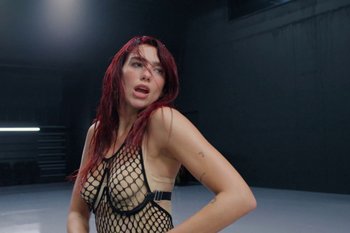Movie still from “Dua Lipa - Houdini” (2023), directed by Manu Cossu – Medium shot, Low angle