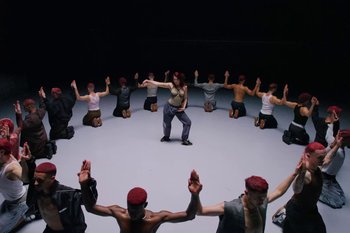 Movie still from “Dua Lipa - Houdini” (2023), directed by Manu Cossu – Wide shot, Overhead angle