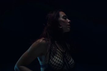 Movie still from “Dua Lipa - Houdini” (2023), directed by Manu Cossu – Close Up shot, Low angle