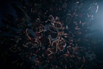 Movie still from “Dua Lipa - Houdini” (2023), directed by Manu Cossu – Extreme Wide shot, Overhead angle