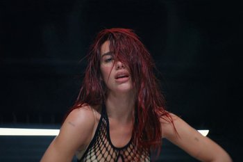 Movie still from “Dua Lipa - Houdini” (2023), directed by Manu Cossu – Close Up shot, High angle