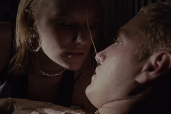 Movie still from “Annet, Nobodylisten - Vrstvy” (2023), directed by Jara Moravec – Extreme Close Up shot, Low angle