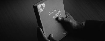 Movie still from “Sampha - Only” (2023), directed by Dexter Navy – Extreme Close Up shot, Overhead angle