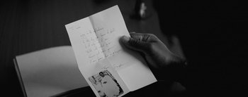 Movie still from “Sampha - Only” (2023), directed by Dexter Navy – Extreme Close Up shot, High angle