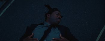 Movie still from “Sampha - Only” (2023), directed by Dexter Navy – Close Up shot, Overhead angle