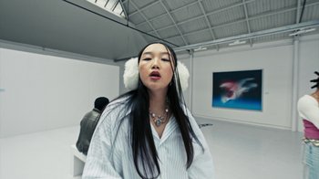 Movie still from “Audrey Nuna - Locket” (2023), directed by Valentin Petit – Medium shot, Low angle