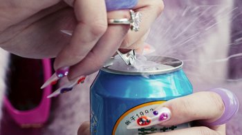 Movie still from “Audrey Nuna - Locket” (2023), directed by Valentin Petit – Extreme Close Up shot, Overhead angle