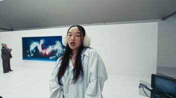 Movie still from “Audrey Nuna - Locket” (2023), directed by Valentin Petit – Medium shot, Low angle