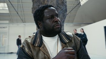 Movie still from “Audrey Nuna - Locket” (2023), directed by Valentin Petit – Close Up shot, Over the shoulder angle