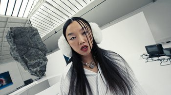 Movie still from “Audrey Nuna - Locket” (2023), directed by Valentin Petit – Close Up shot, Low angle