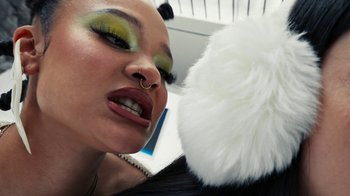 Movie still from “Audrey Nuna - Locket” (2023), directed by Valentin Petit – Extreme Close Up shot, Overhead angle