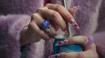 Movie still from “Audrey Nuna - Locket” (2023), directed by Valentin Petit – Extreme Close Up shot, Overhead angle