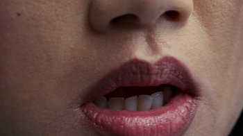 Movie still from “Audrey Nuna - Locket” (2023), directed by Valentin Petit – Extreme Close Up shot, Low angle