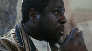 Movie still from “Audrey Nuna - Locket” (2023), directed by Valentin Petit – Close Up shot, Low angle