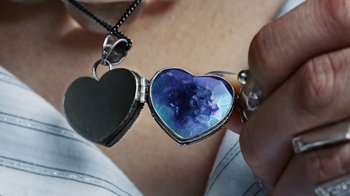 Movie still from “Audrey Nuna - Locket” (2023), directed by Valentin Petit – Extreme Close Up shot, Overhead angle