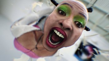 Movie still from “Audrey Nuna - Locket” (2023), directed by Valentin Petit – Extreme Close Up shot, Overhead angle