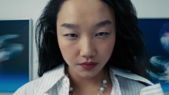 Movie still from “Audrey Nuna - Locket” (2023), directed by Valentin Petit – Extreme Close Up shot, High angle