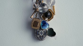 Movie still from “Audrey Nuna - Locket” (2023), directed by Valentin Petit – Extreme Close Up shot, Overhead angle