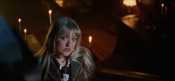 Movie still from “DJ Suzy - Wings” (2023), directed by SWIM CLUB – Close Up shot, High angle