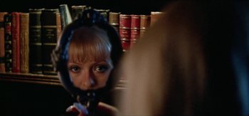 Movie still from “DJ Suzy - Wings” (2023), directed by SWIM CLUB – Extreme Close Up shot, Overhead angle