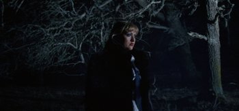 Movie still from “DJ Suzy - Wings” (2023), directed by SWIM CLUB – Medium shot, Low angle