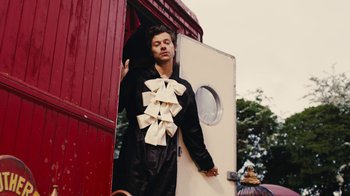 Movie still from “Harry Styles - Daylight” (2023), directed by Tanu Muiño – Medium shot, Low angle