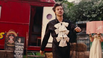 Movie still from “Harry Styles - Daylight” (2023), directed by Tanu Muiño – Medium shot, Low angle