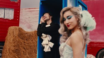 Movie still from “Harry Styles - Daylight” (2023), directed by Tanu Muiño – Medium shot, Over the shoulder angle