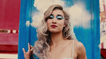 Movie still from “Harry Styles - Daylight” (2023), directed by Tanu Muiño – Close Up shot, Low angle