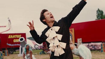Movie still from “Harry Styles - Daylight” (2023), directed by Tanu Muiño – Medium shot, Low angle