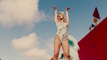 Movie still from “Harry Styles - Daylight” (2023), directed by Tanu Muiño – Medium shot, Low angle