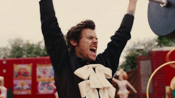 Movie still from “Harry Styles - Daylight” (2023), directed by Tanu Muiño – Close Up shot, Low angle