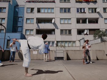 Movie still from “Paul Kalkbrenner - Schwer” (2023), directed by Jovan Todorović – Extreme Wide shot, Low angle