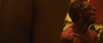 Movie still from “The Blaze - MADLY” (2023), directed by The Blaze – Extreme Close Up shot, Over the shoulder angle