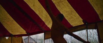 Movie still from “The Blaze - MADLY” (2023), directed by The Blaze – Medium shot, Low angle