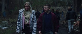 Movie still from “The Blaze - MADLY” (2023), directed by The Blaze – Medium shot, Low angle
