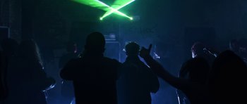 Movie still from “The Blaze - MADLY” (2023), directed by The Blaze – Medium shot, Low angle