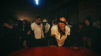 Movie still from “James Blake - Big Hammer” (2023), directed by Oscar Hudson – Medium shot, Low angle