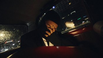 Movie still from “James Blake - Big Hammer” (2023), directed by Oscar Hudson – Close Up shot, Overhead angle