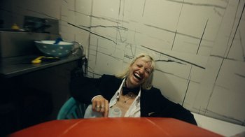 Movie still from “James Blake - Big Hammer” (2023), directed by Oscar Hudson – Medium shot, High angle