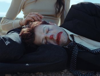 Movie still from “Jesse - Rainbow” (2023), directed by Ramez Silyan – Close Up shot, High angle