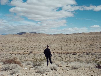 Movie still from “Jesse - Rainbow” (2023), directed by Ramez Silyan – Extreme Wide shot, High angle