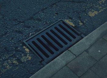 Movie still from “LA Priest - It’s You” (2023), directed by Eoin Glaister – Extreme Close Up shot, Overhead angle