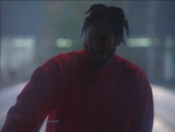Movie still from “Maxo - Free!” (2023), directed by Vincent Haycock – Medium shot, Low angle
