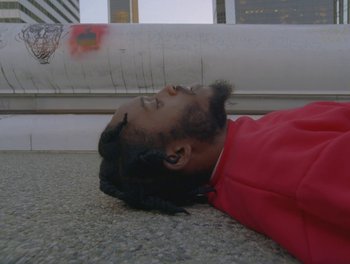 Movie still from “Maxo - Free!” (2023), directed by Vincent Haycock – Medium shot, Overhead angle
