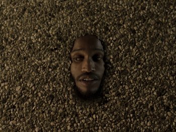 Movie still from “Maxo - Free!” (2023), directed by Vincent Haycock – Extreme Close Up shot, Overhead angle