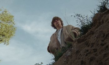 Movie still from “The Kid LAROI - …Growing Up” (2023), directed by Ramez Silyan – Wide shot, Low angle