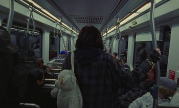 Movie still from “The Kid LAROI - …Growing Up” (2023), directed by Ramez Silyan – Medium shot, High angle