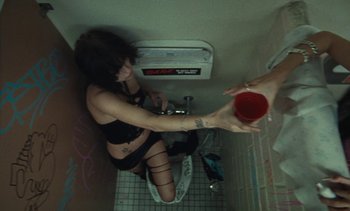 Movie still from “The Kid LAROI - …Growing Up” (2023), directed by Ramez Silyan – Medium shot, Overhead angle